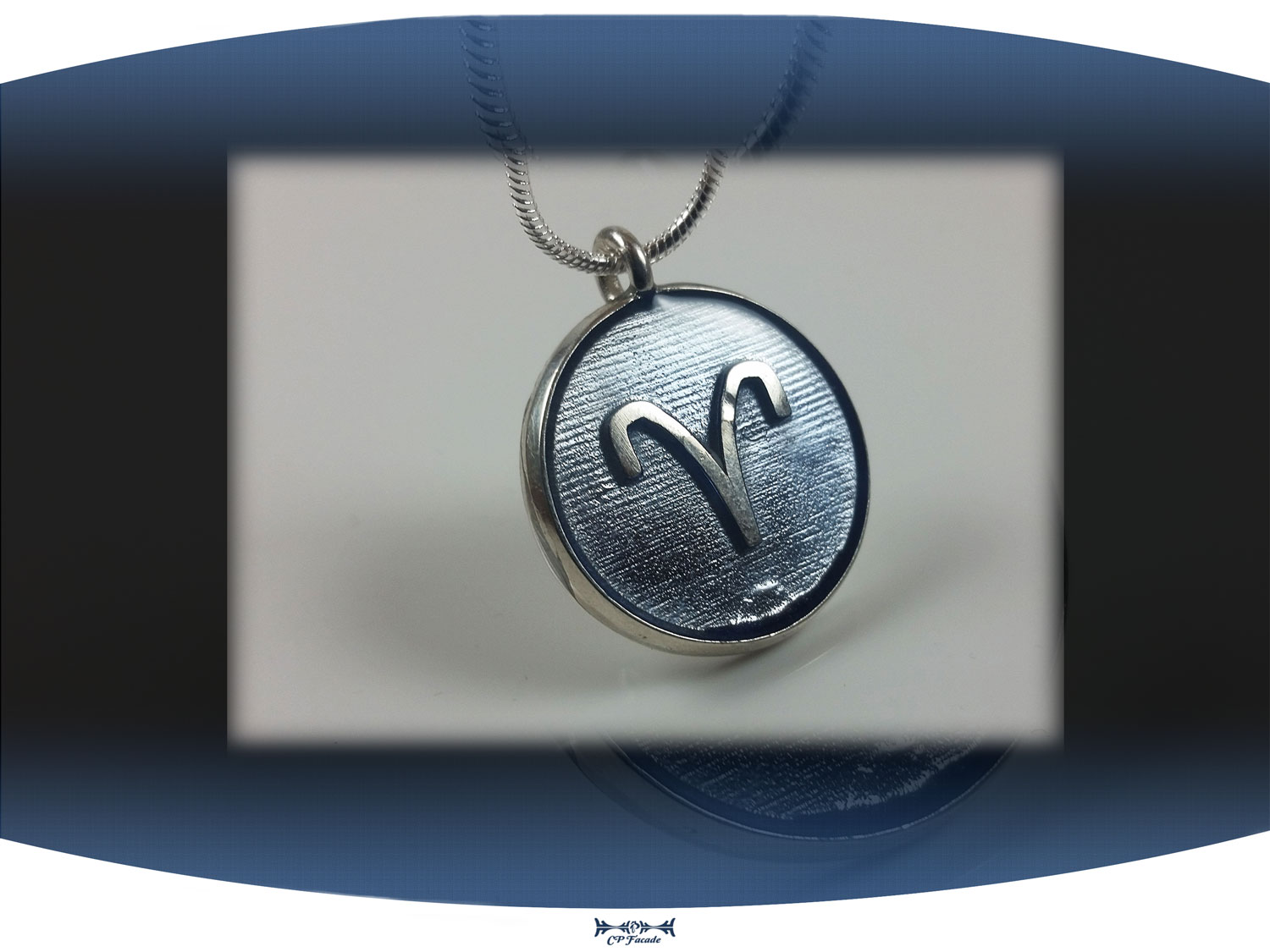 Sterling silver zodiac sign  aries pendant with light blue resin and star constellation on the back
