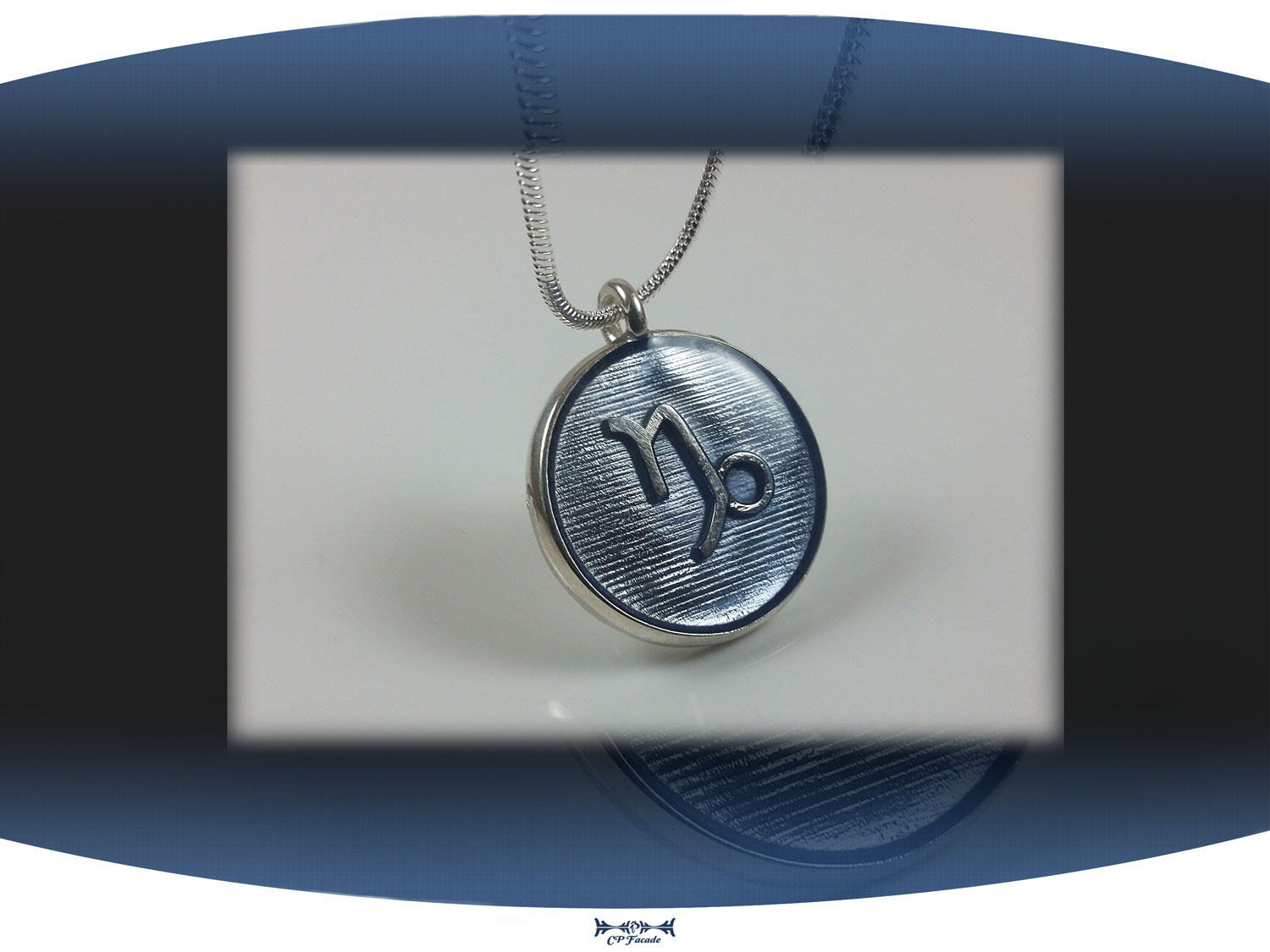 Sterling silver zodiac sign  capricorn pendant with light blue resin and star constellation on the back