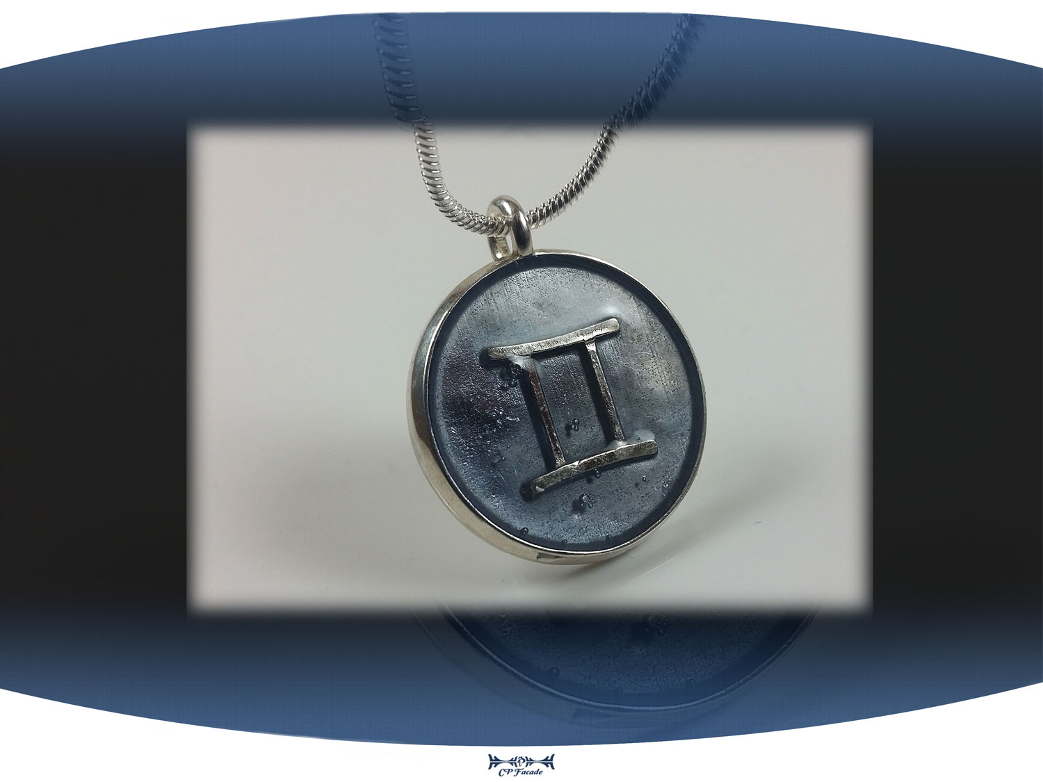 Sterling silver zodiac sign  gemini pendant with light blue resin and star constellation on the back