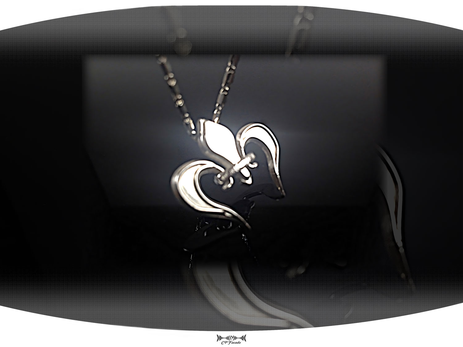 Sterling silver custom heart shaped fleur de lis necklace